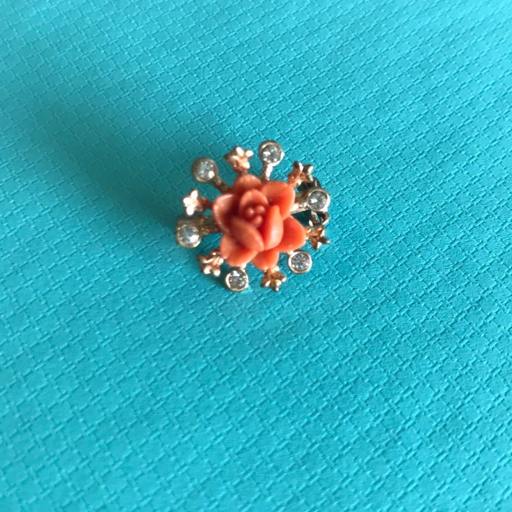 Vintage carved rose brooch